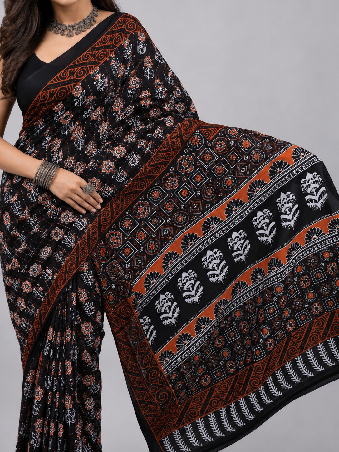 Kesari Mul Cotton Black Saree with Orange and White Motifs