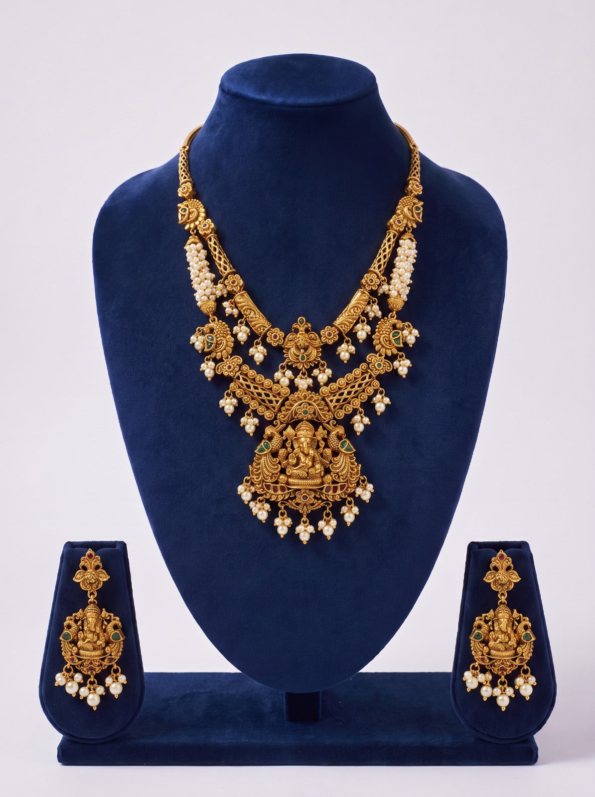 Two Layer Ganapathy Haram With Pearl Beads And Earrings